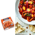 Squid in tomato sauce with bell peppers